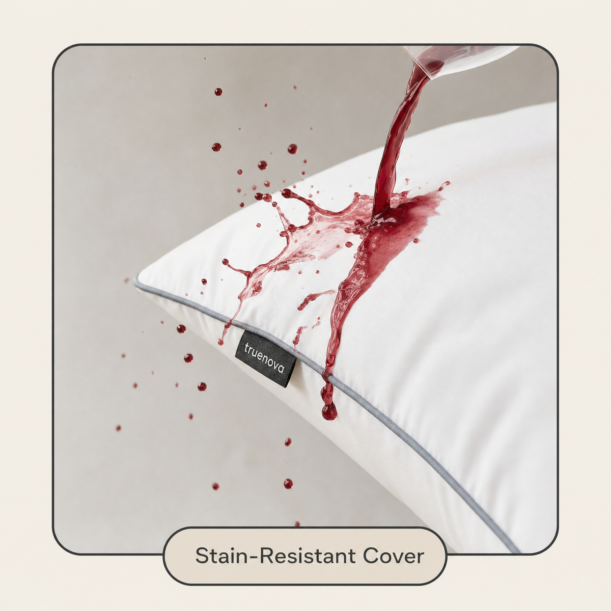 Red wine splashing on the Haven pillow's stain-resistant cover