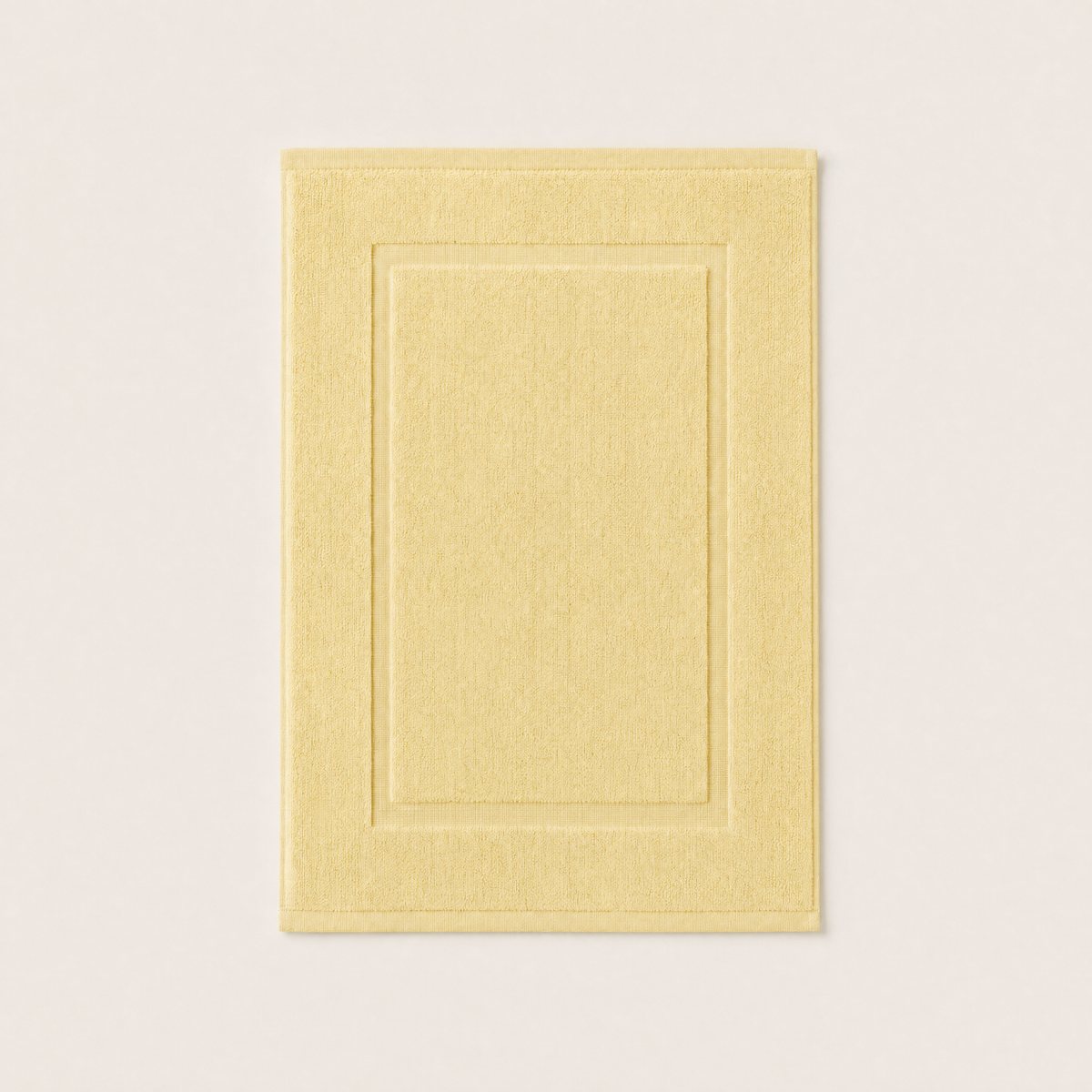 Solace bath mat in Butter Yellow