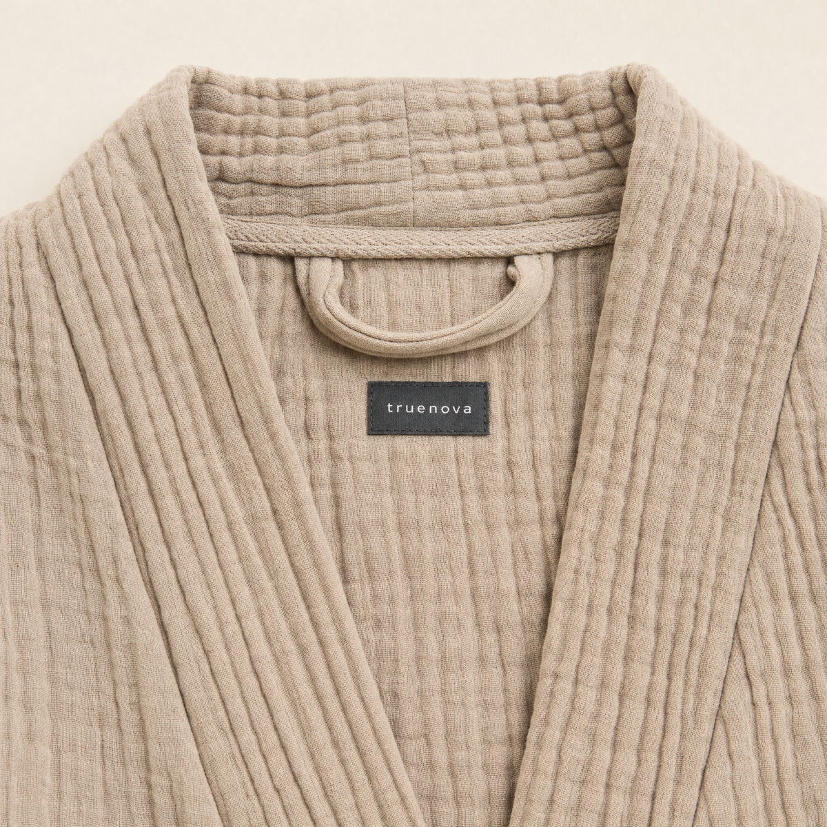 Truenova label inside the neck of the Breeze robe