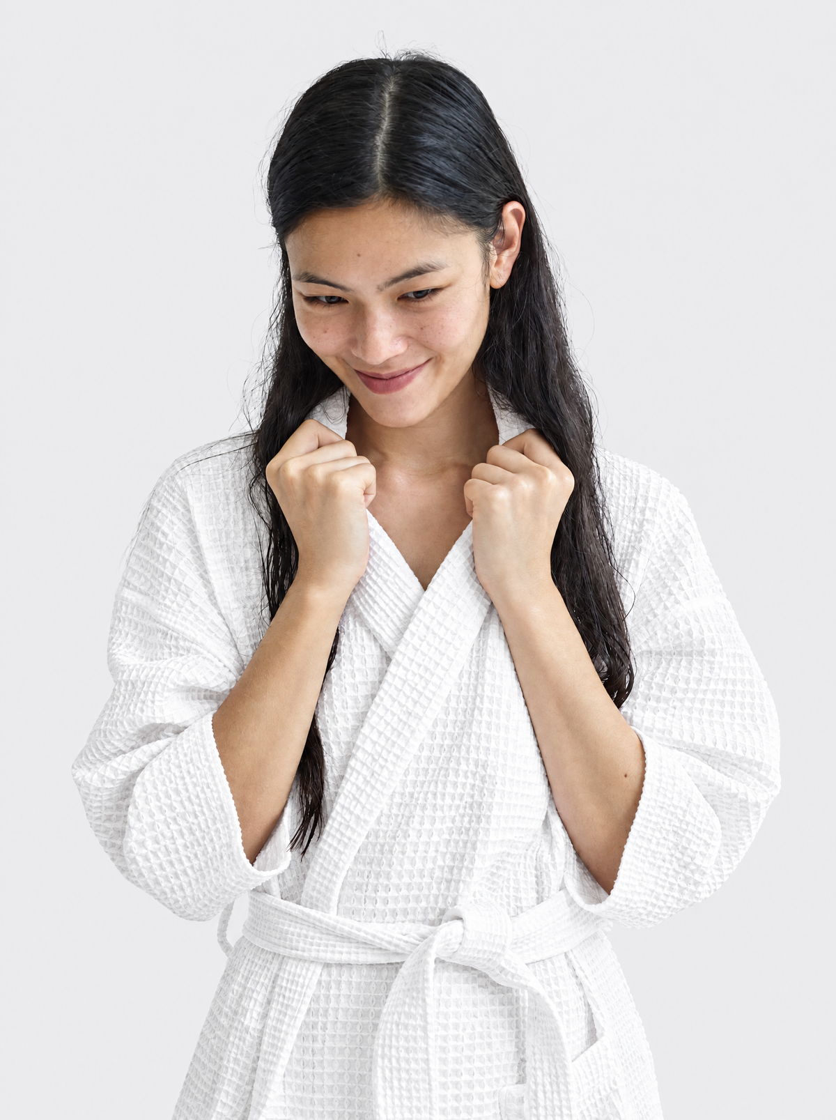 Close-up of the Truenova Waffle Robe in White