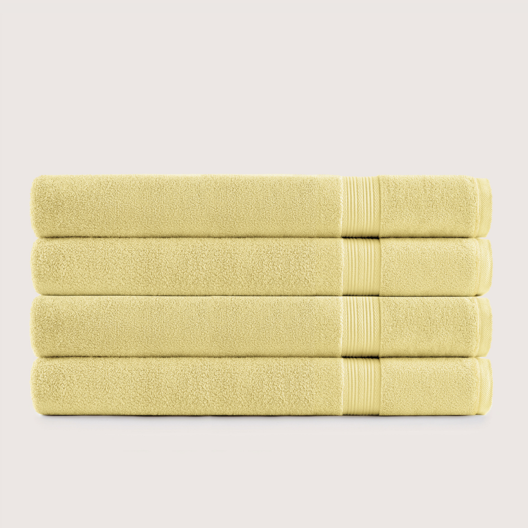 Pack of 4 Truenova Ultrasoft cotton bath sheets in Butter Yellow