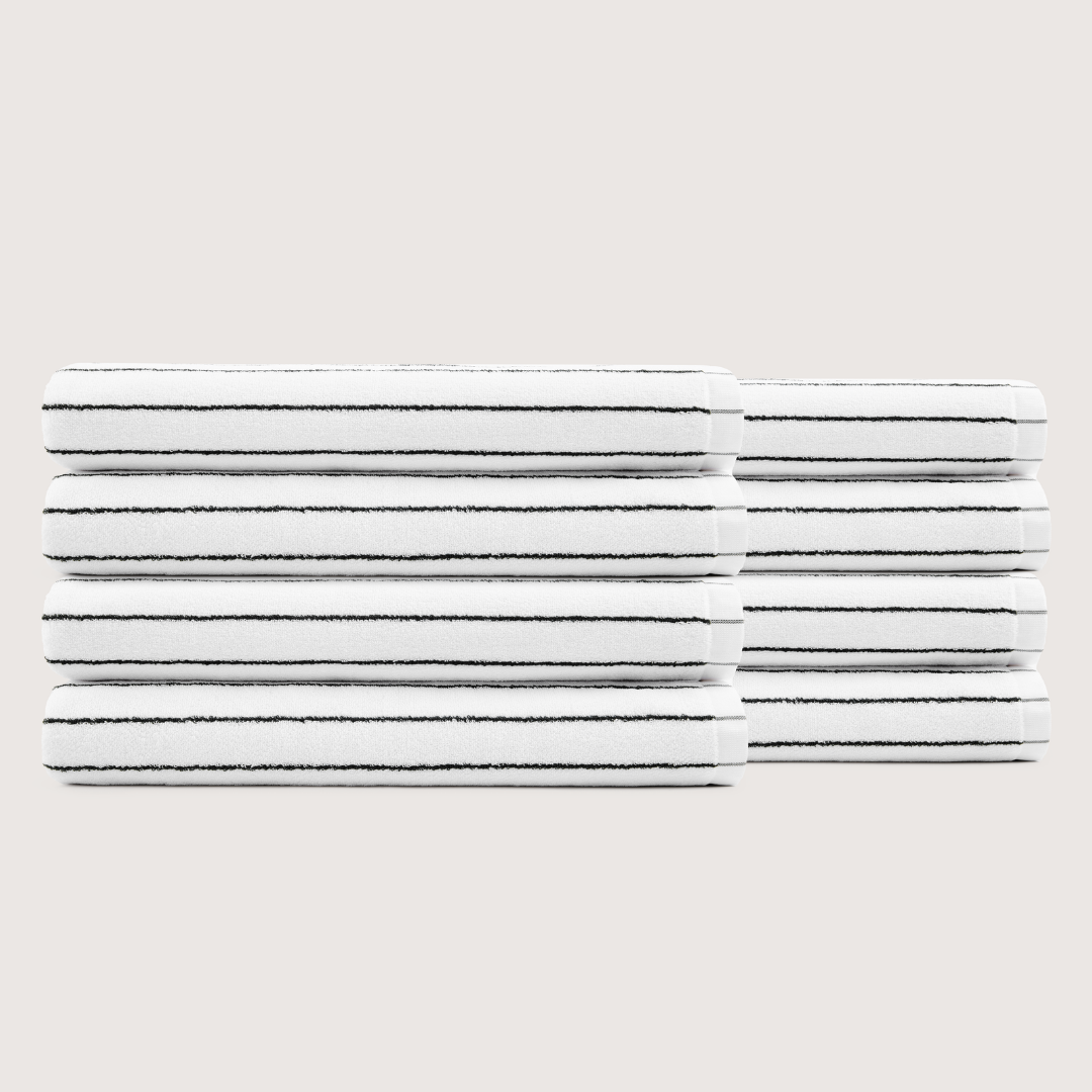 Pack of 8 Truenova Ultrasoft cotton bath sheets in Cloud White & Black stripe