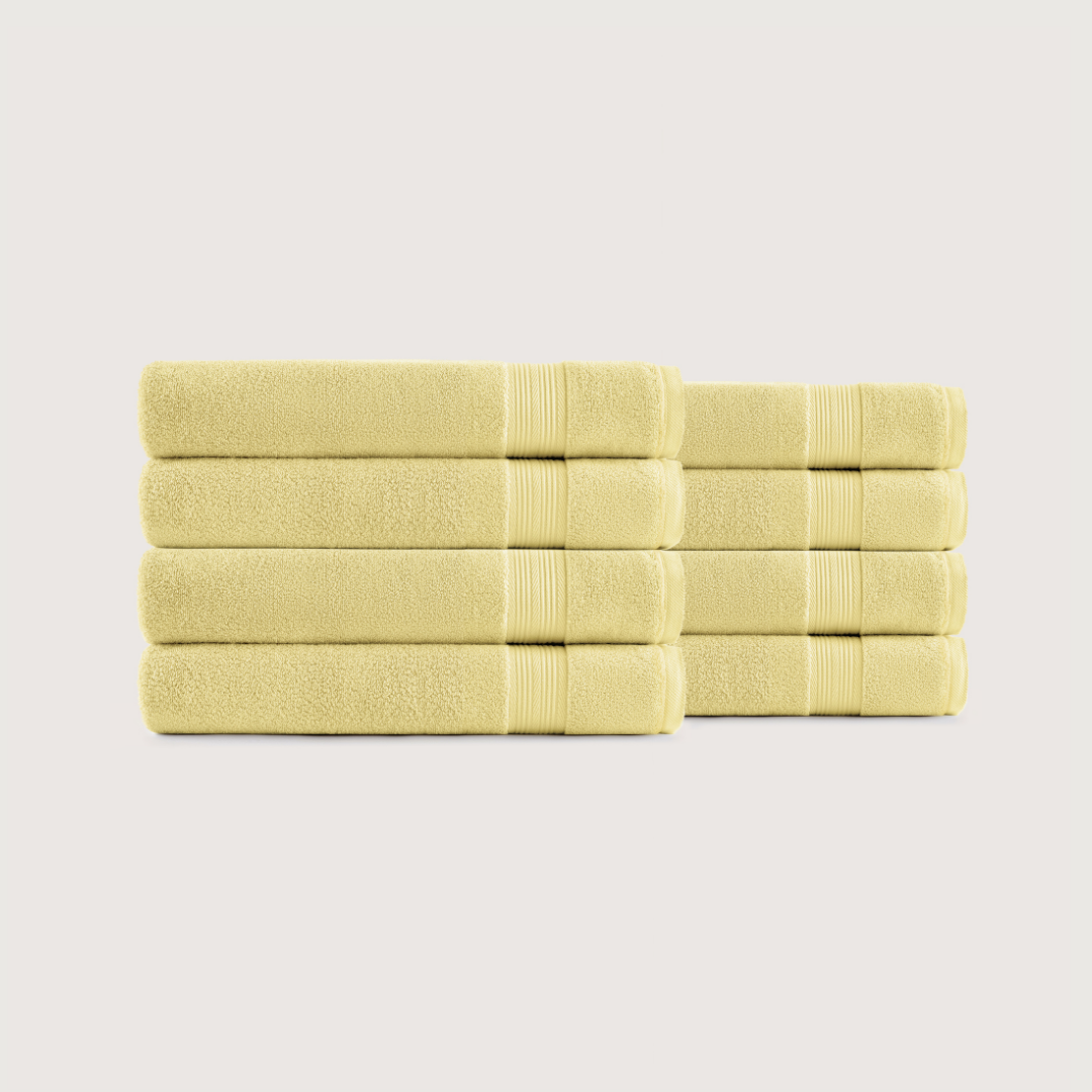 Pack of 8 Truenova Ultrasoft cotton bath towels in Butter Yellow