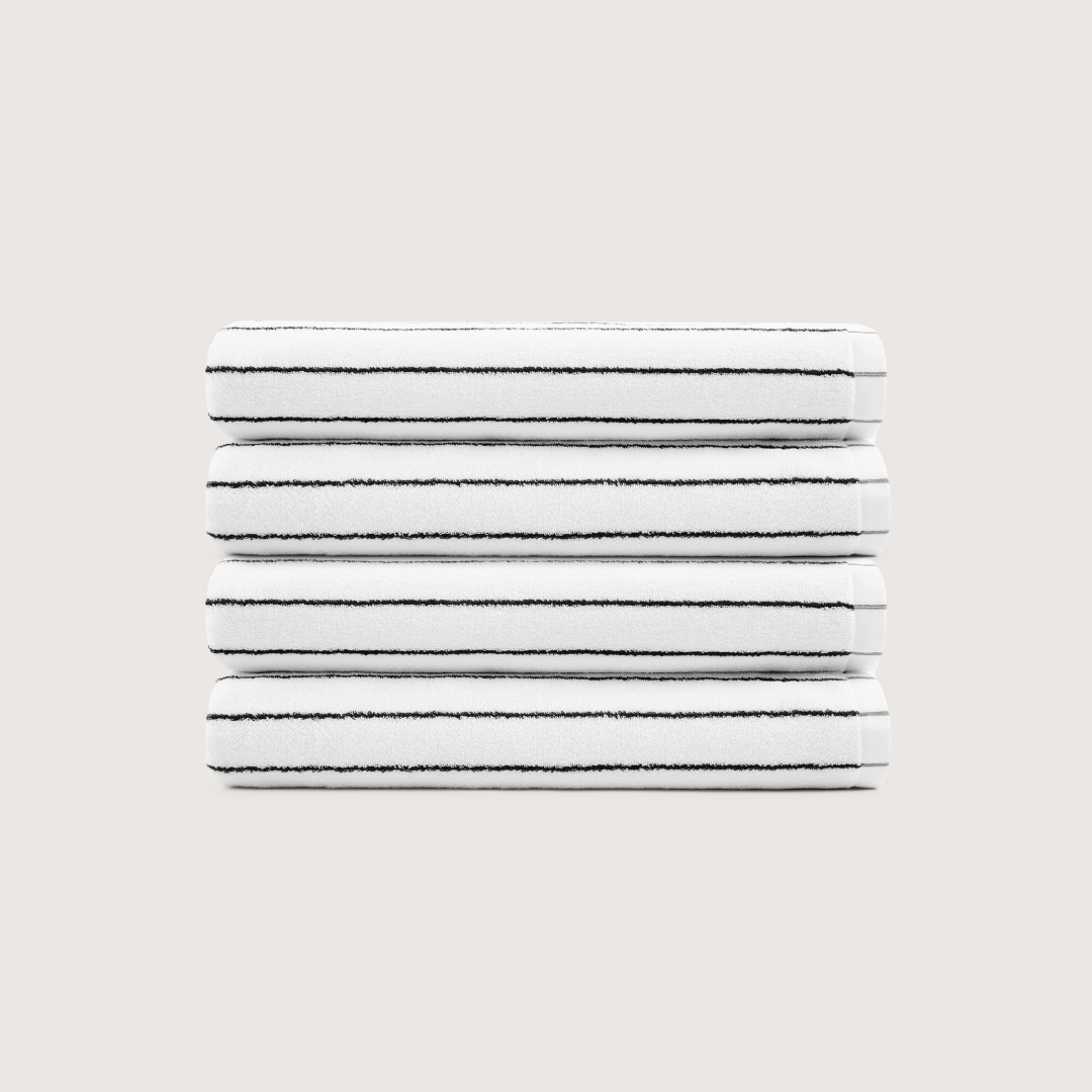 Pack of 4 Truenova Ultrasoft cotton bath towels in Cloud White & Black stripe