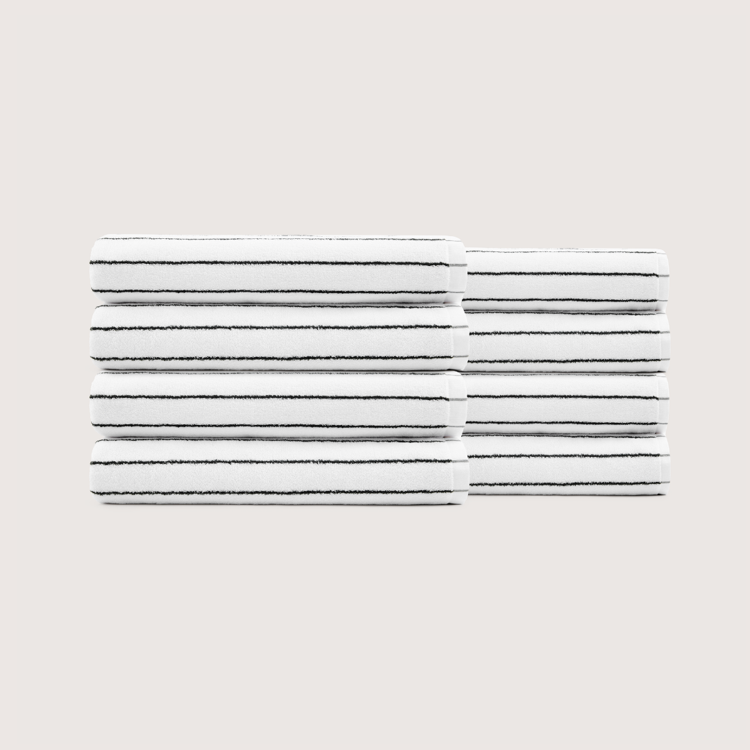 Pack of 8 Truenova Ultrasoft cotton bath towels in Cloud White & Black stripe