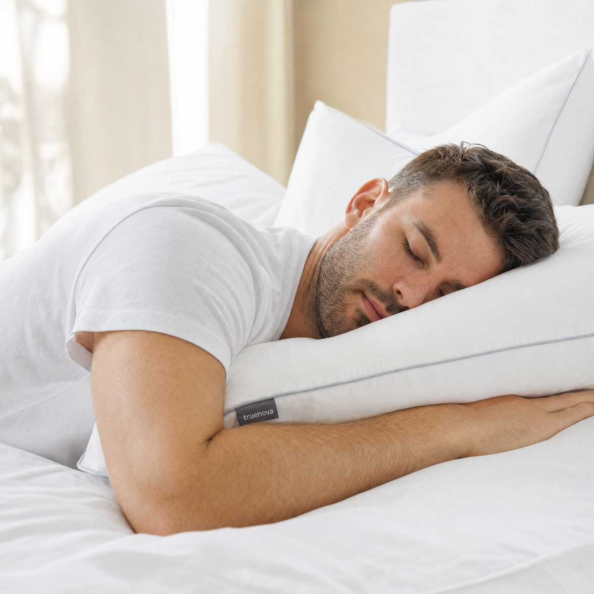 Man stomach sleeping on the Haven hotel pillow
