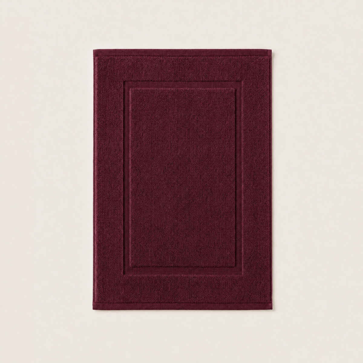 Solace bath mat in Burgundy