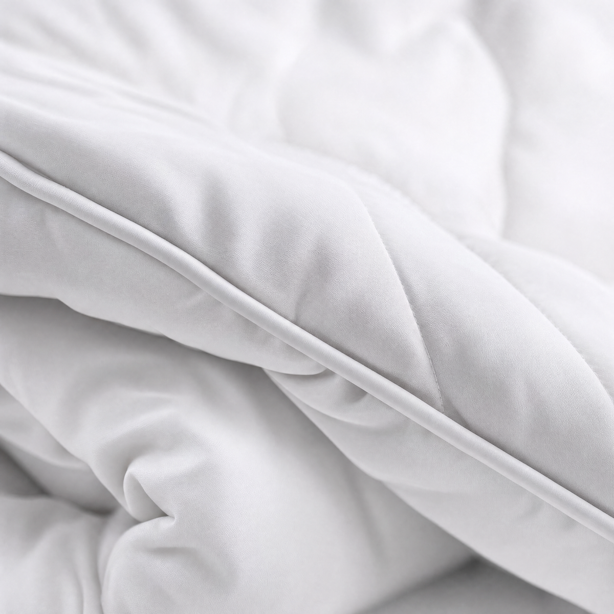 Close-up of the Polar comforter quilting and edge