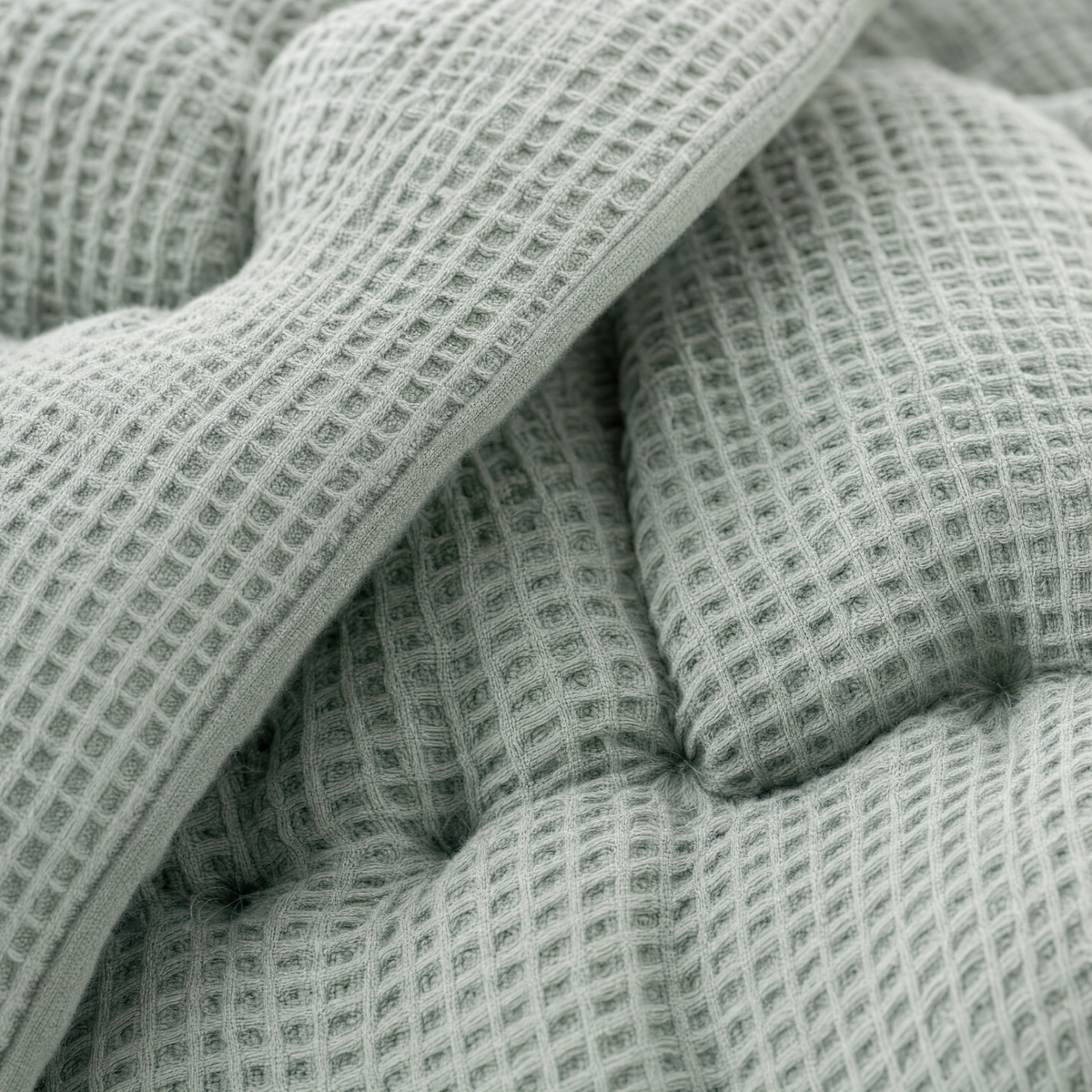 Close-up of the Ripple waffle weave and tufting