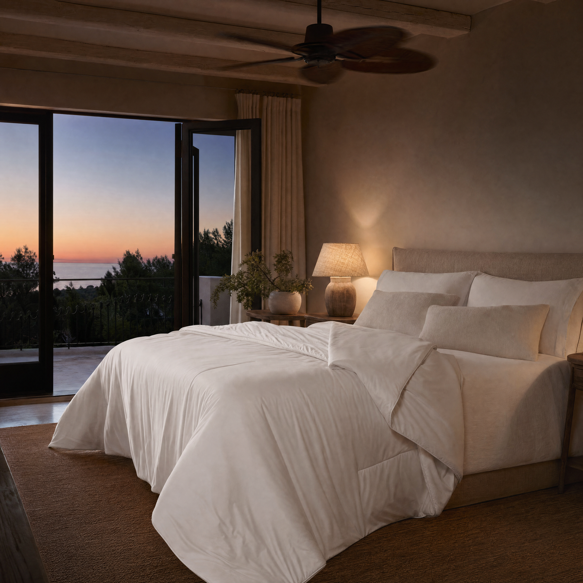 Frost comforter on a bed on a warm summer evening