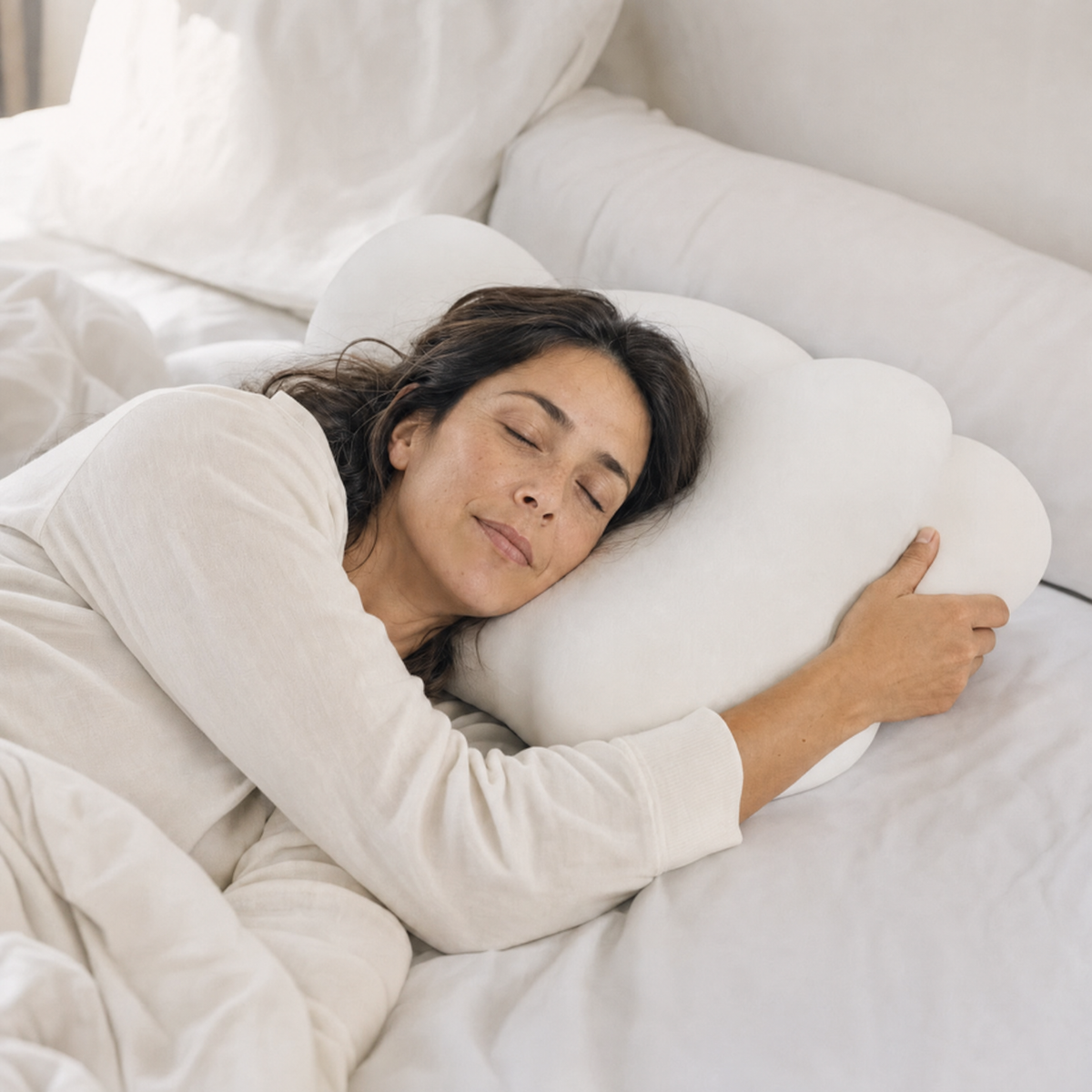 Woman sleeping on her side on the Orbit pillow