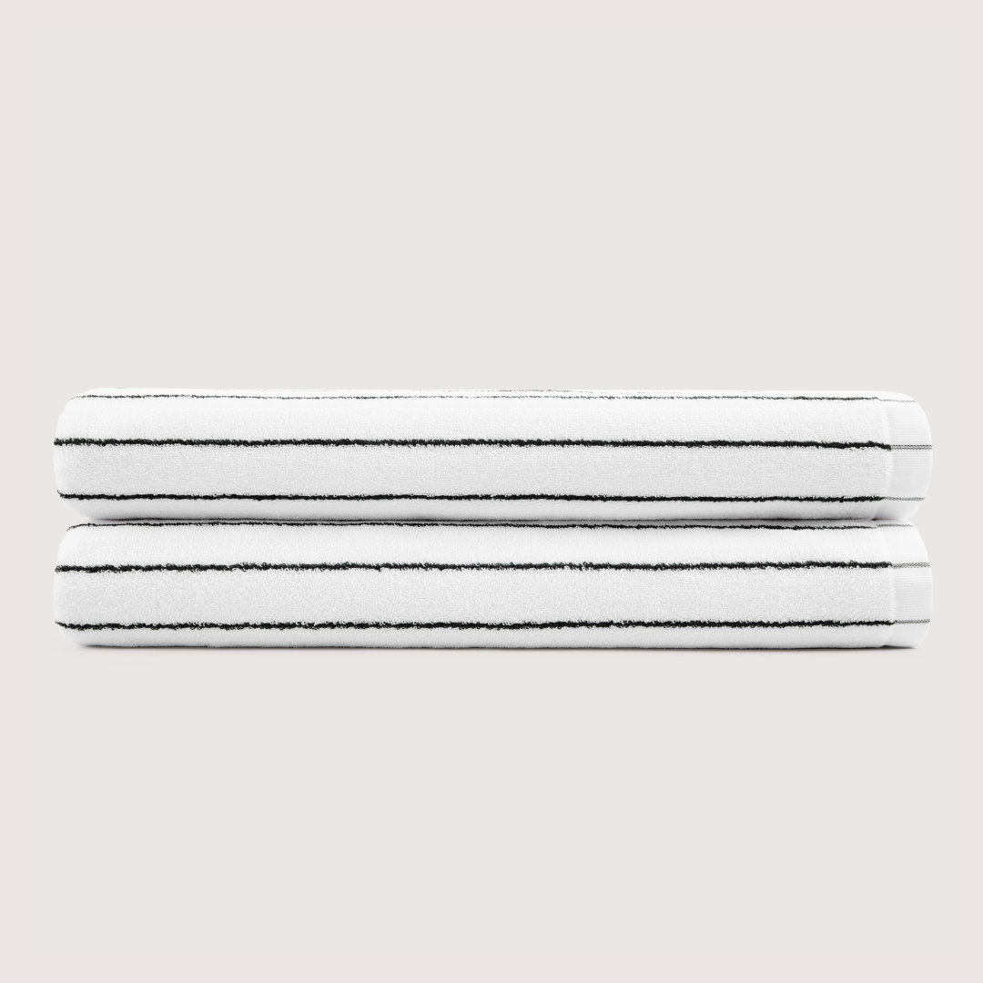 Pack of 2 Truenova Ultrasoft cotton bath sheets in Cloud White & Black stripe